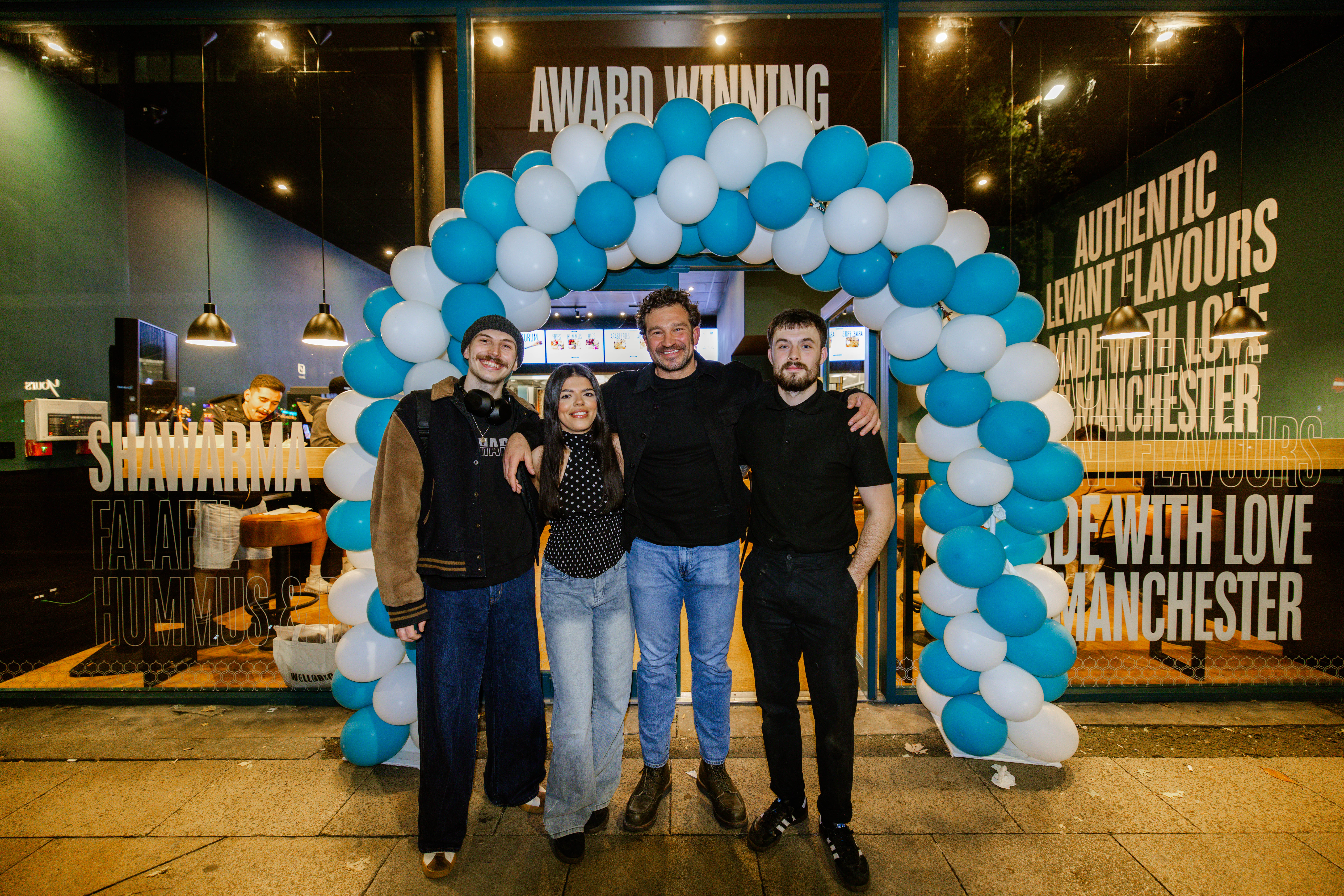 Sqew team outside their new Manchester restaurant